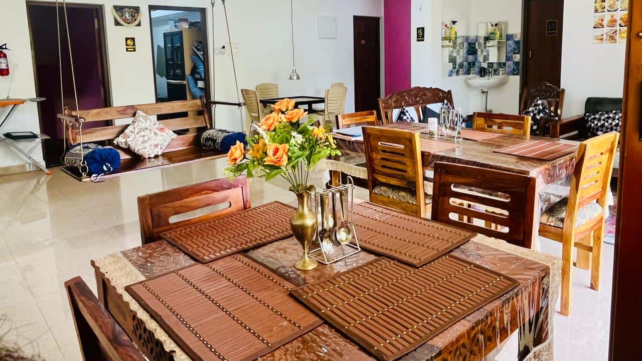 Shared living area on the guest floor at Happy Moon Homestay, Corjuem, Aldona