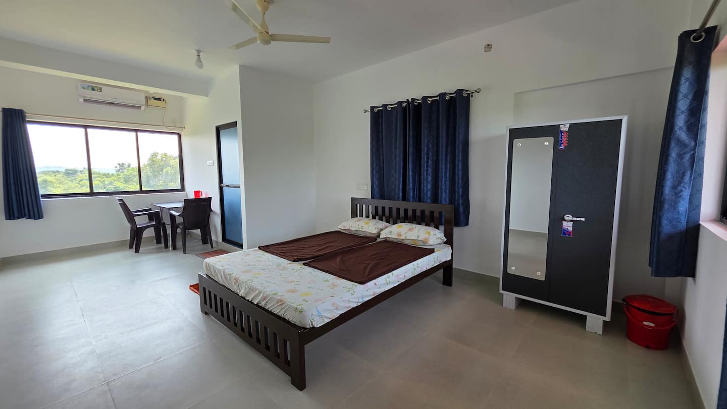 Happy Moon (Ruturaj) Hall Room with queen bed